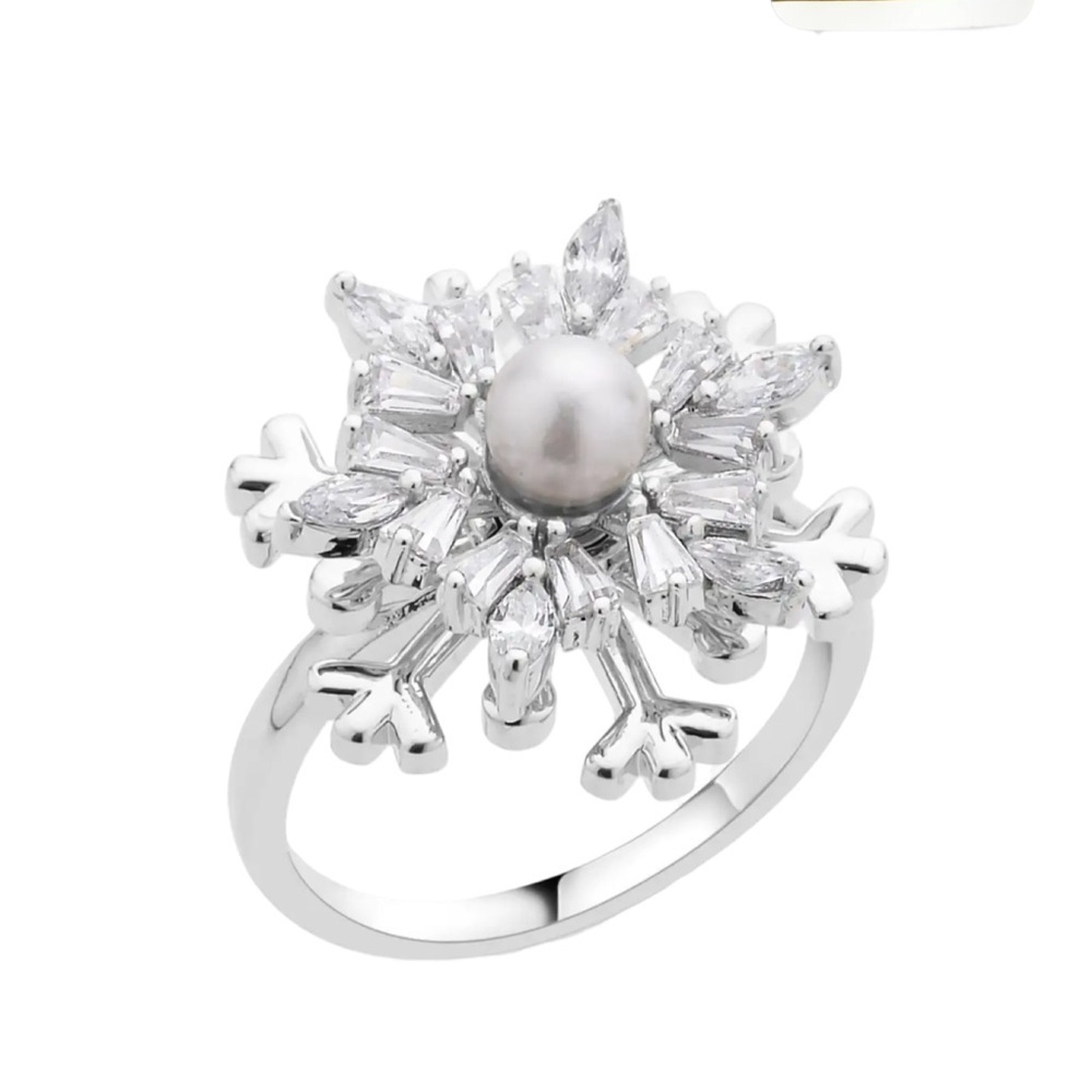 White Shell Pearl and Simulated Diamond Snowflake Spinner Ring in Silvertone